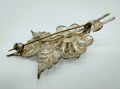 Silver filigree brooch, 835