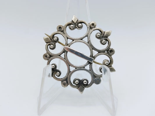 Silberbrosche, GJ van den Bergh, Schoonhoven