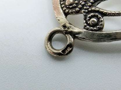 Silver openwork pendant