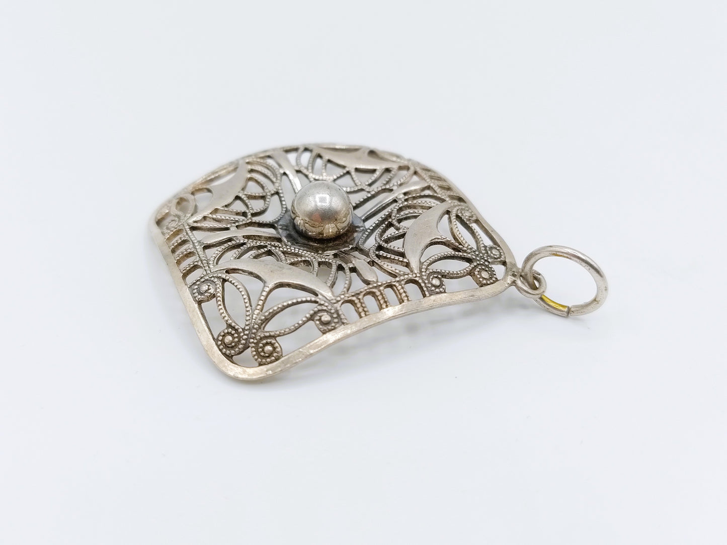 Silver openwork pendant