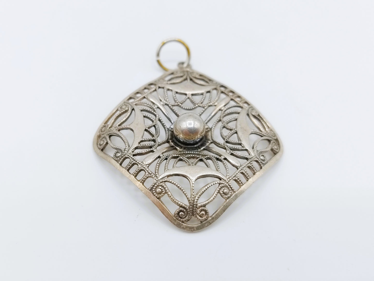 Silver openwork pendant