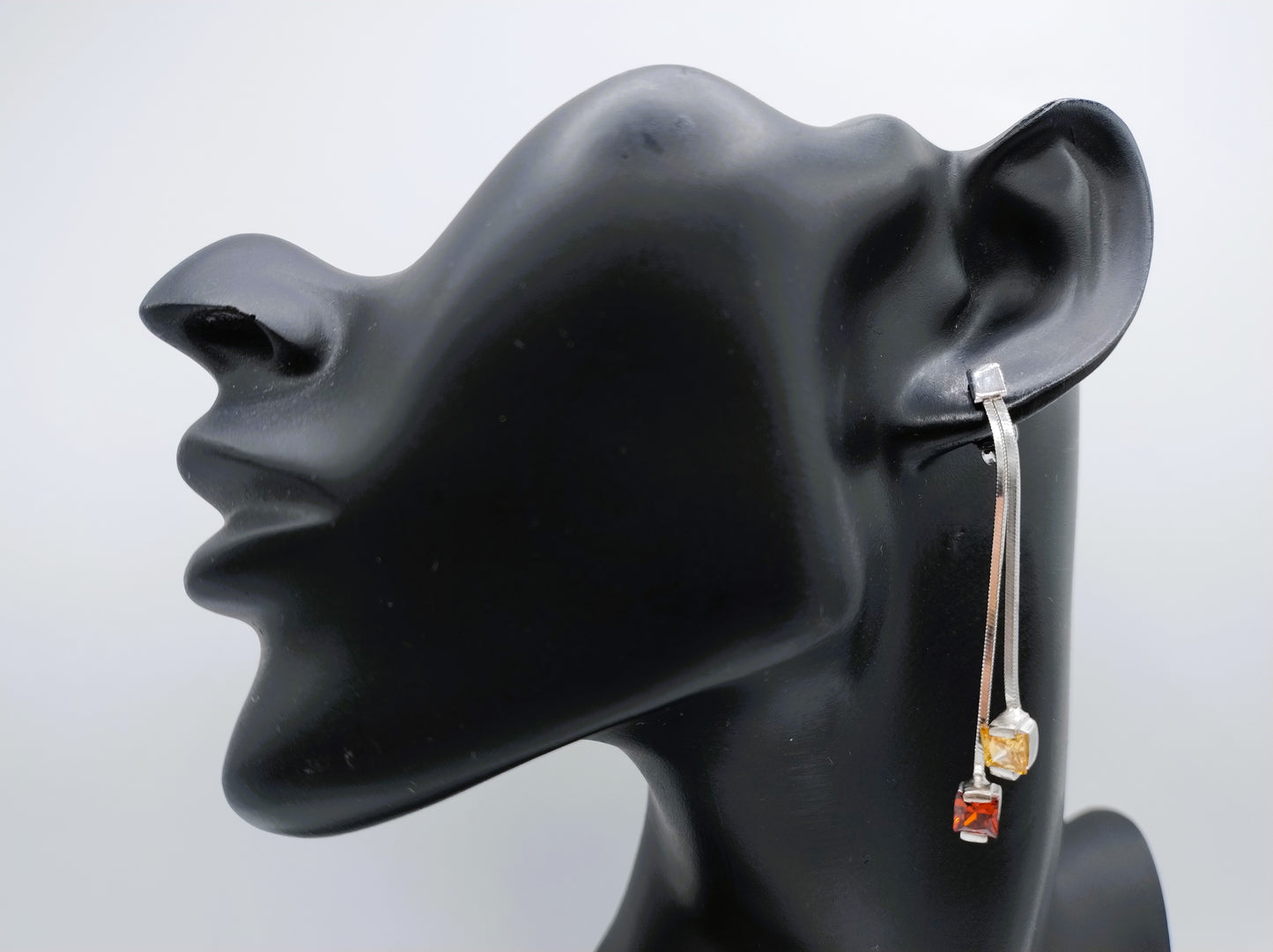Silver designer earrings, long model