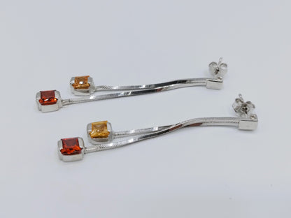 Silver designer earrings, long model