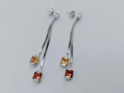 Silver designer earrings, long model