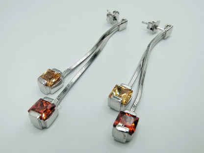 Silver designer earrings, long model