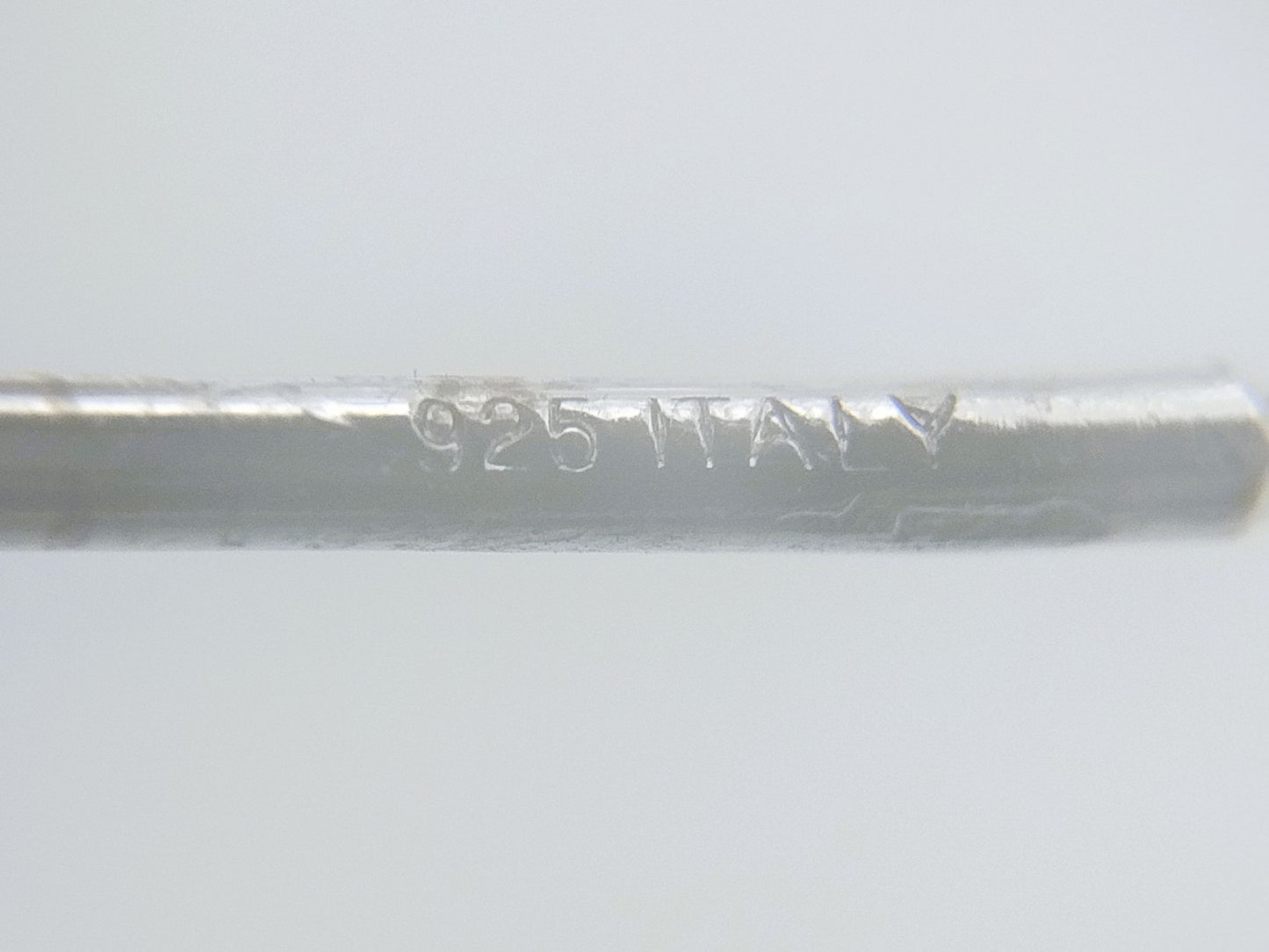 Silver designer earrings, long model