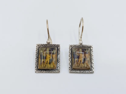 Silver earrings with an image of a painting