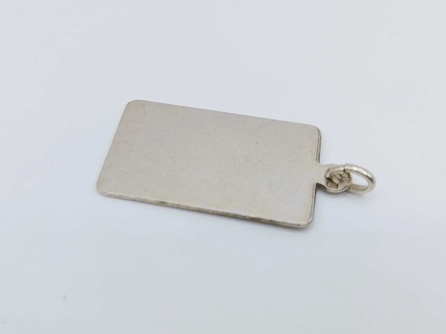 Zilveren hanger met afbeelding motorrijder