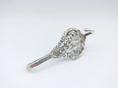 Silver bag hook with Lady Justice