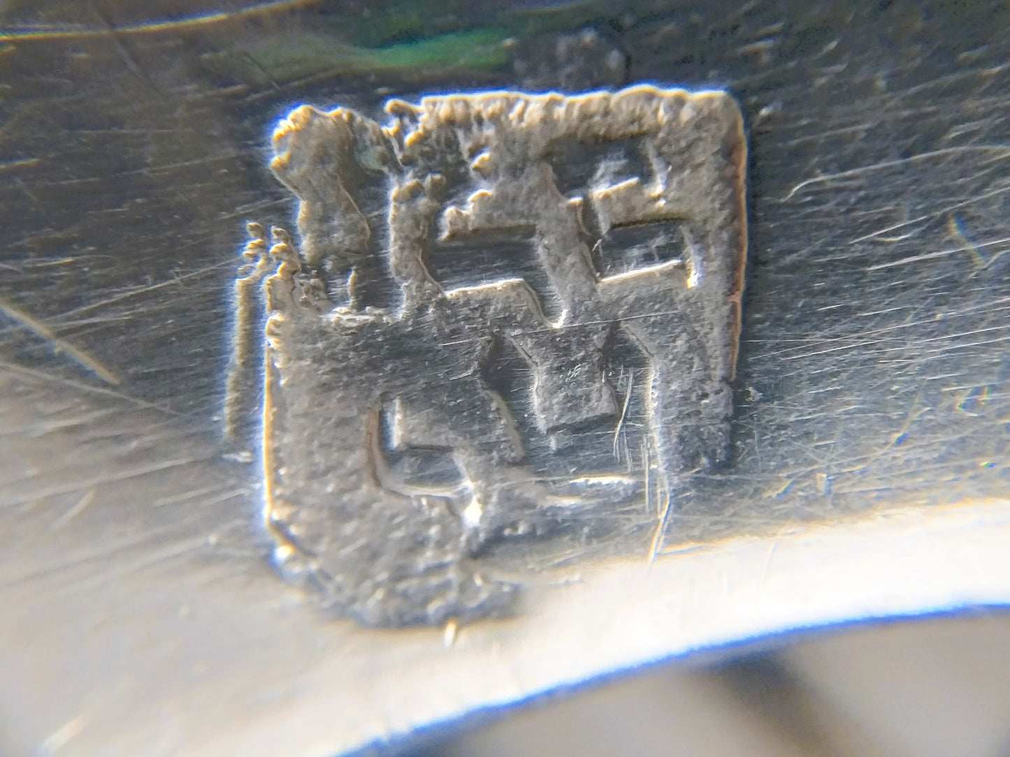 Silver bag hook with Lady Justice