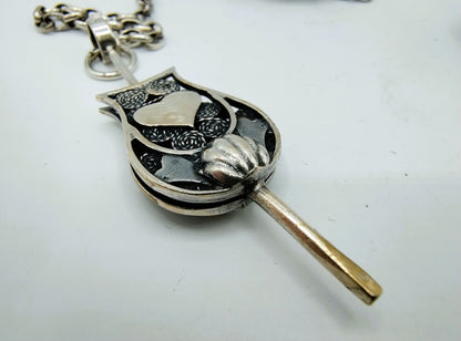 Silver men's chatelaine, Fa. Niekerk, Schoonhoven, 48 cm.