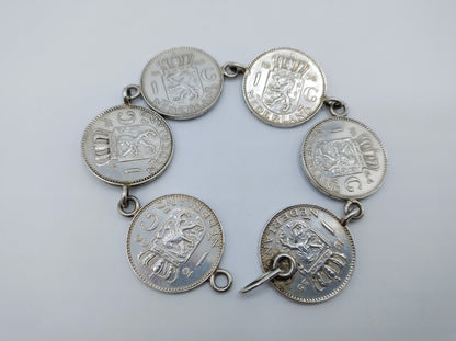Silver bracelet with 6 guilders from Juliana, 20 cm