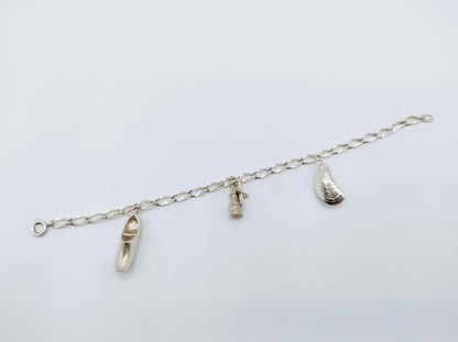 Silver charm bracelet with 3 charms, 18.5 cm