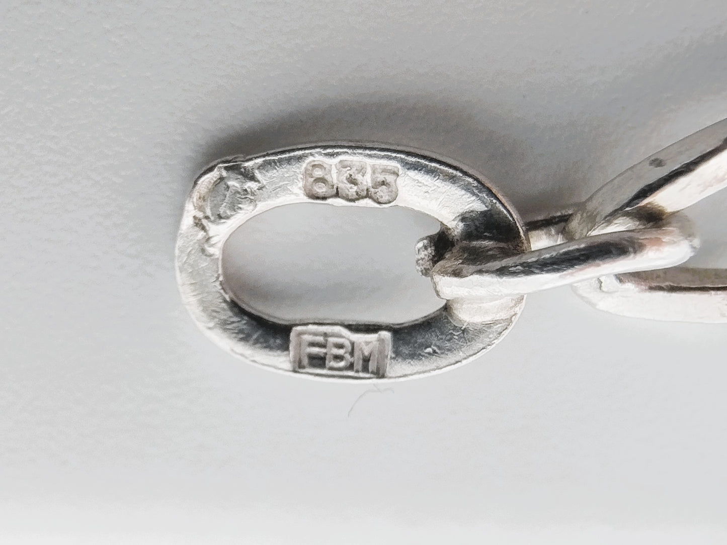 Silver charm bracelet with 3 charms, 18.5 cm