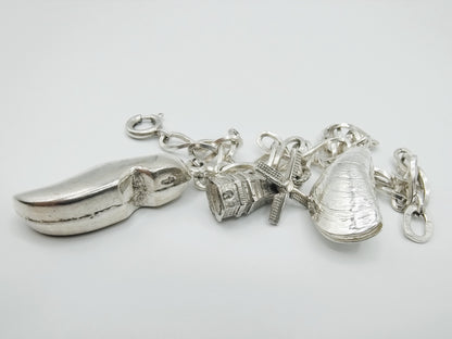 Silver charm bracelet with 3 charms, 18.5 cm