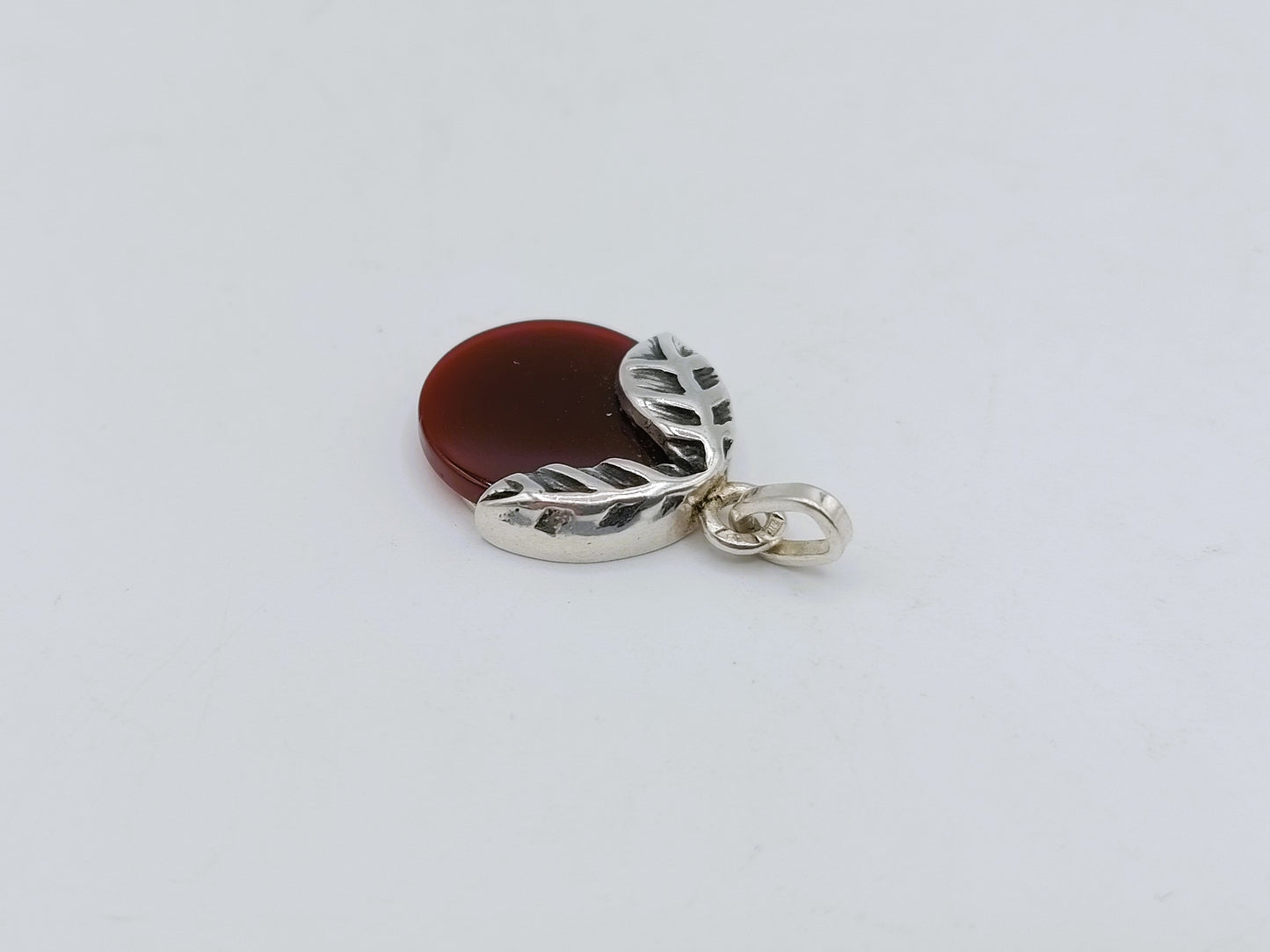 Silver pendant with carnelian