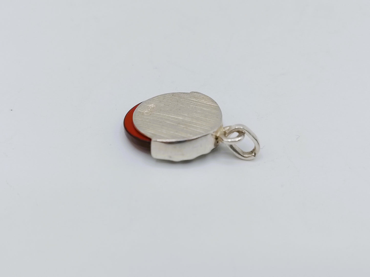 Silver pendant with carnelian