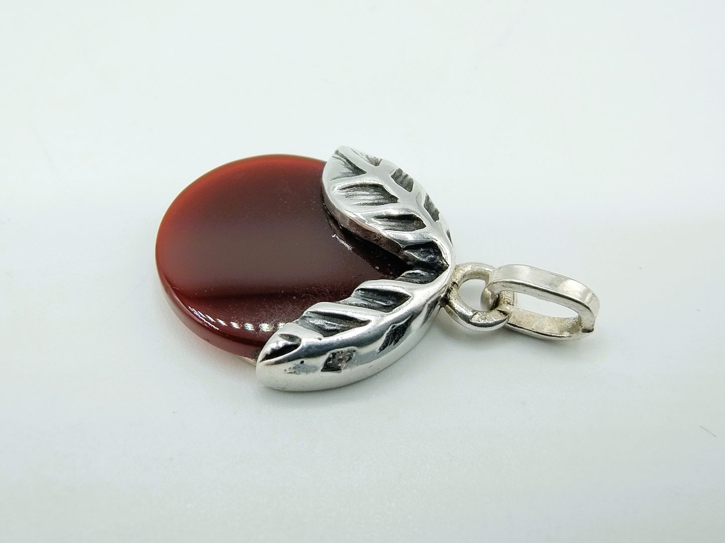 Silver pendant with carnelian