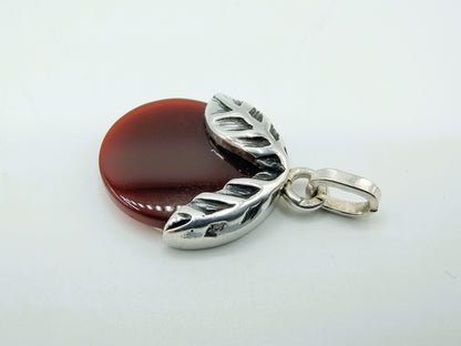 Silver pendant with carnelian