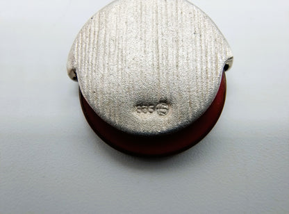 Silver pendant with carnelian