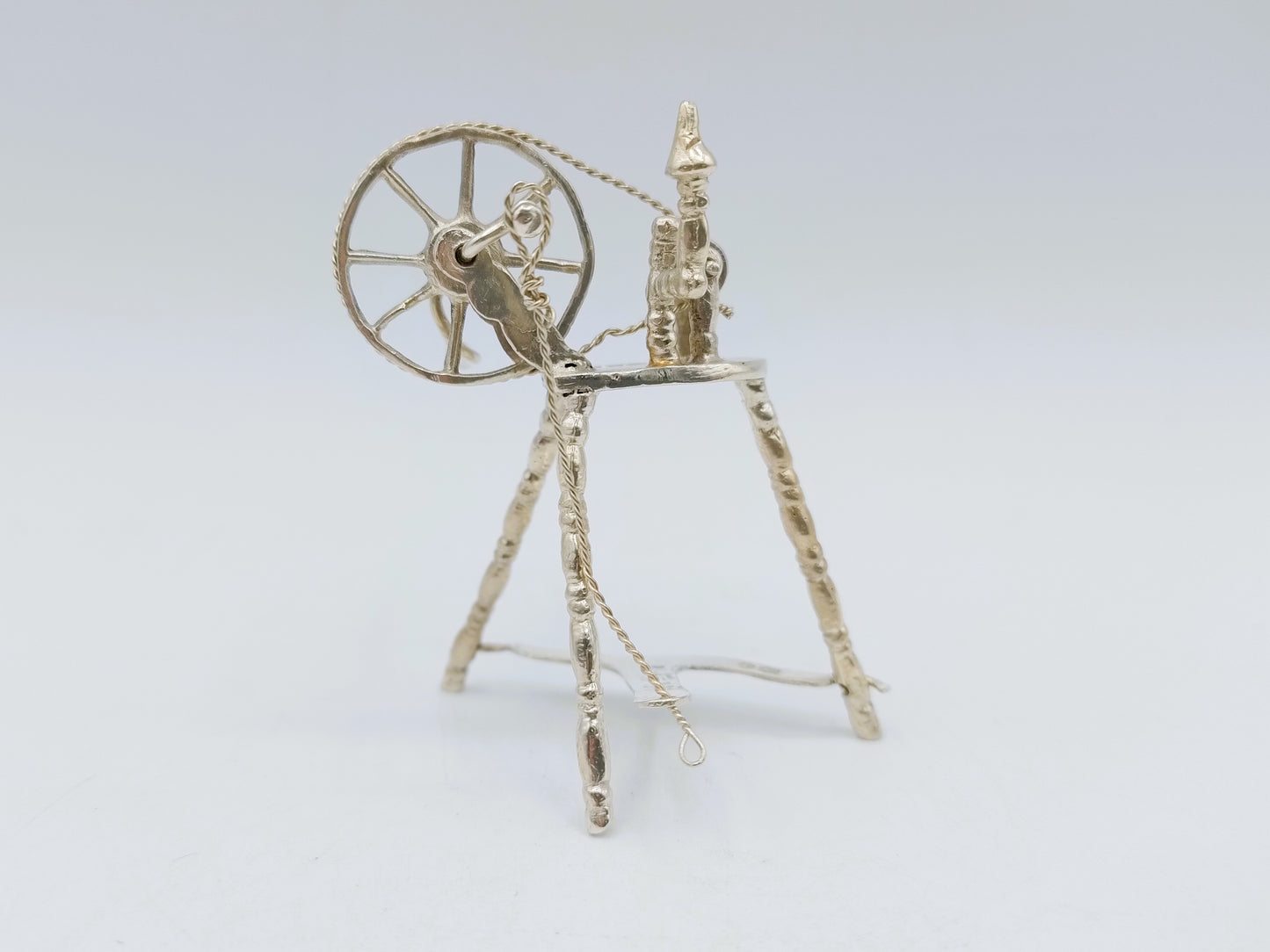 Silver miniature spinning wheel, D.N. Bridge, London, 1895