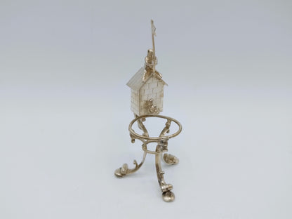 Silver miniature spring house with child, 19th century