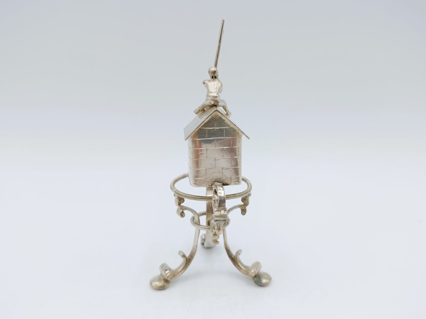 Silver miniature spring house with child, 19th century