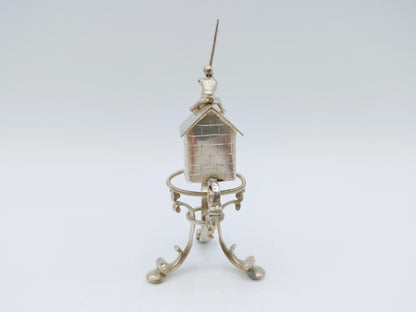 Silver miniature spring house with child, 19th century