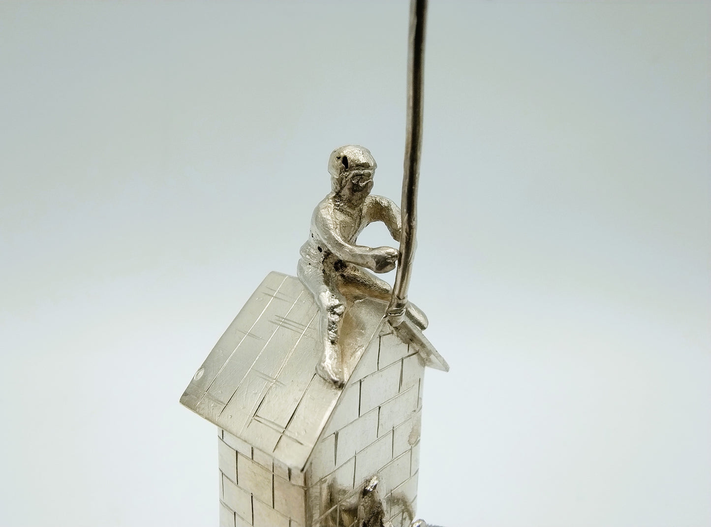 Silver miniature spring house with child, 19th century