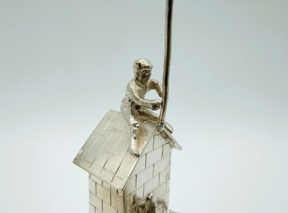 Silver miniature spring house with child, 19th century