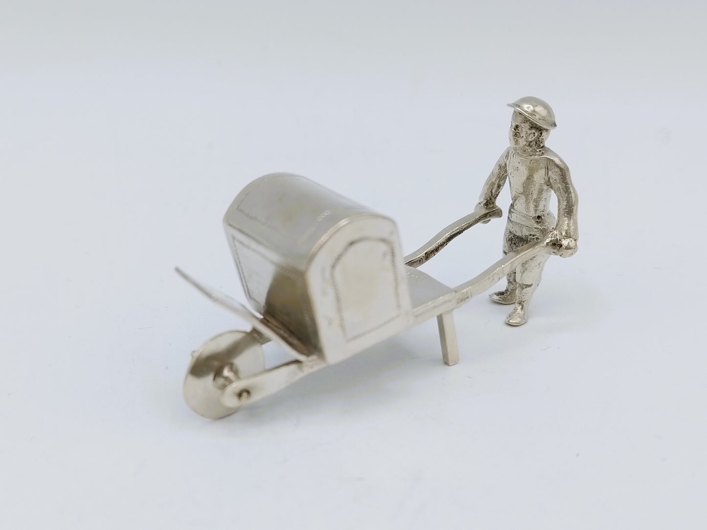 Silver miniature, man with wheelbarrow, 19th century