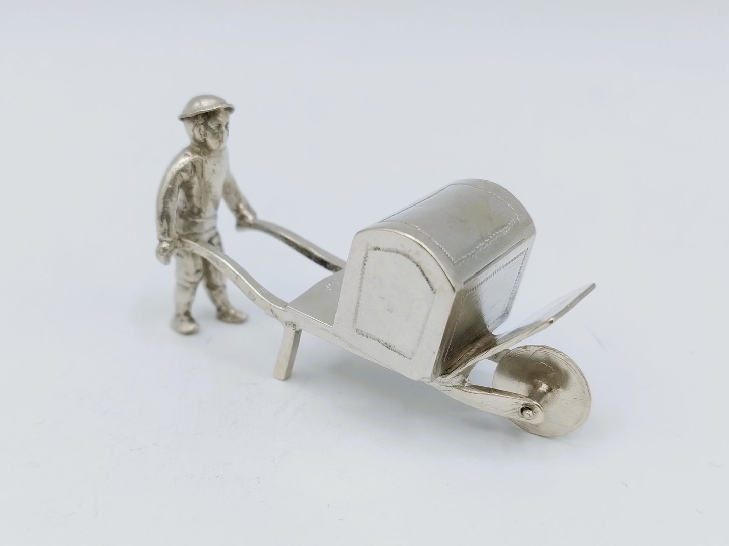 Silver miniature, man with wheelbarrow, 19th century