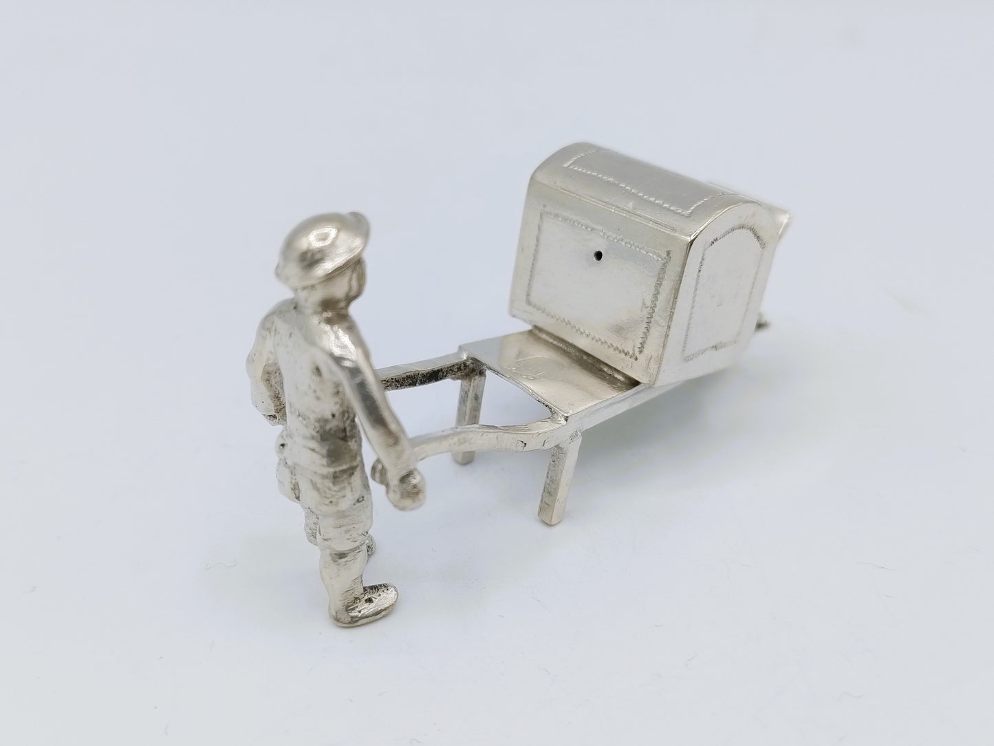 Silver miniature, man with wheelbarrow, 19th century