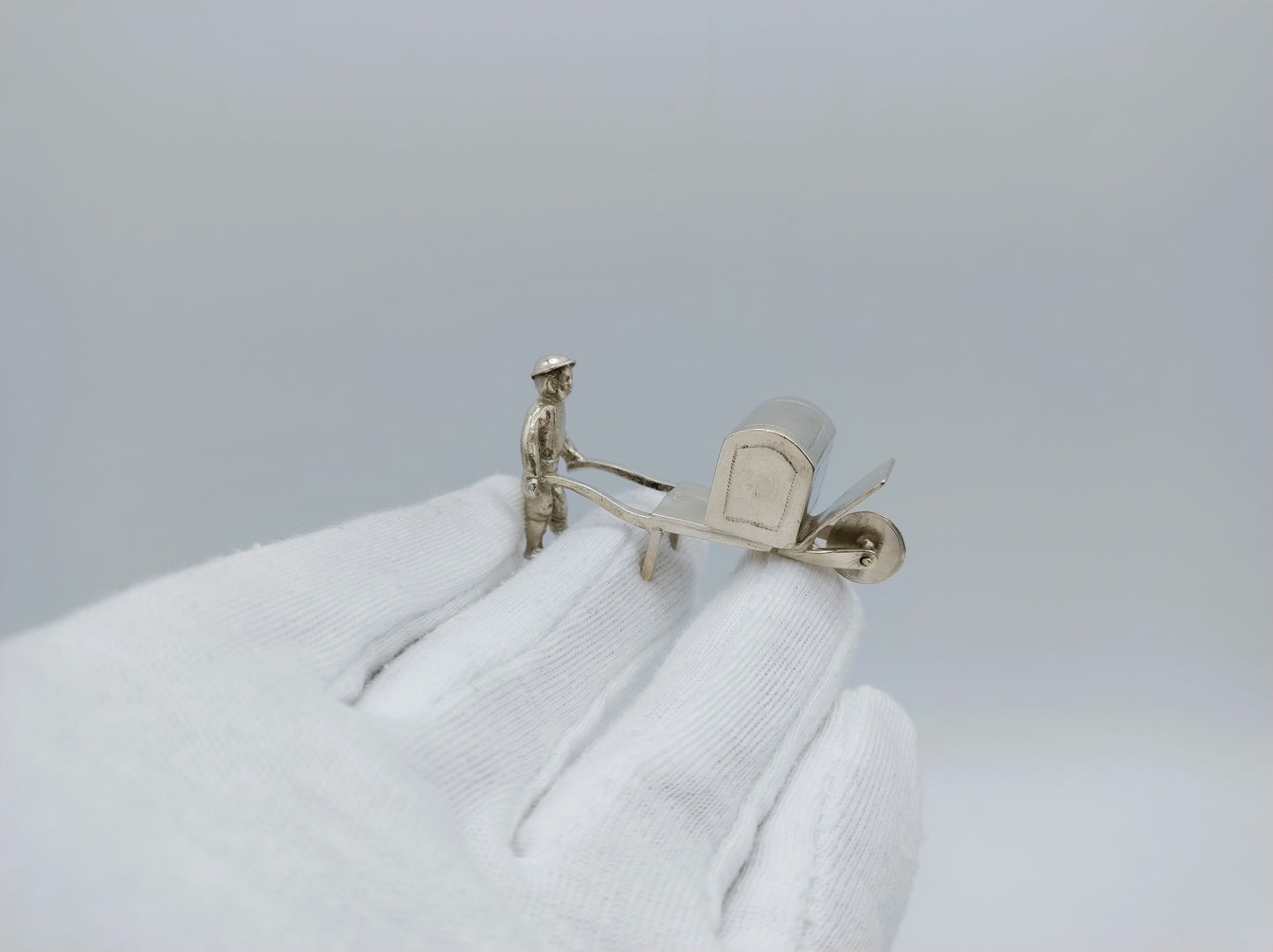 Silver miniature, man with wheelbarrow, 19th century