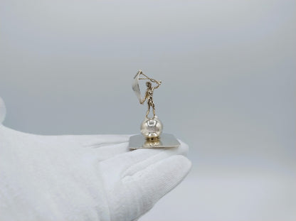 Zilveren miniatuur jongen met vlieger, A. van der Hoeff, Haarlem, ca. 1710