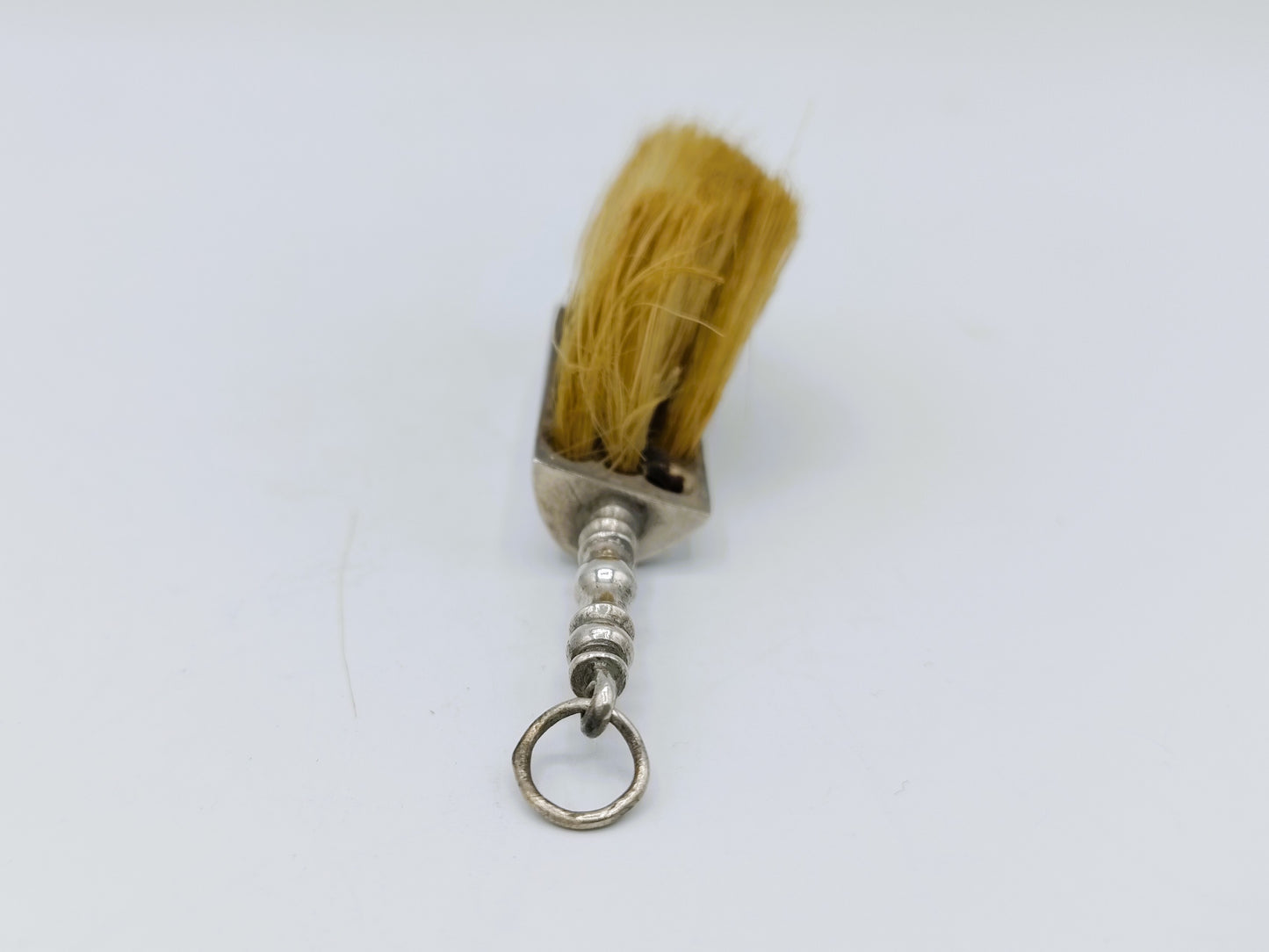 Zilveren miniatuur stoffer, A. van Geffen, Amsterdam, 1737