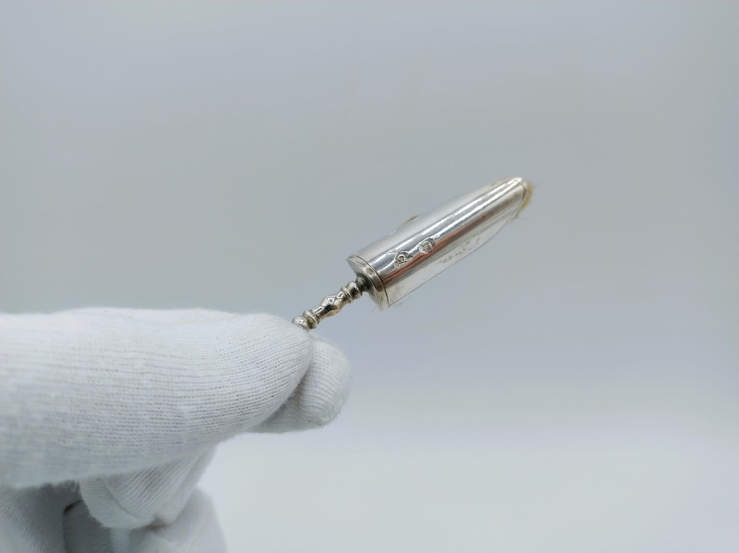 Zilveren miniatuur stoffer, A. van Geffen, Amsterdam, 1737