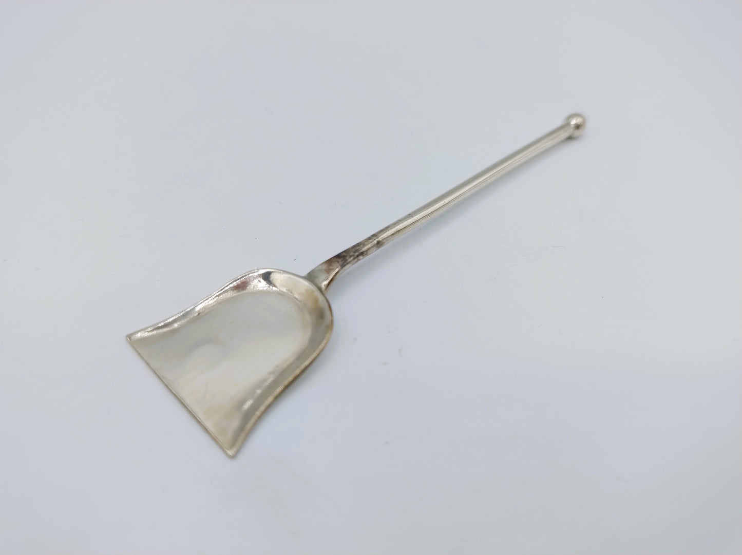 Silver salt spoon with pseudo-hallmark