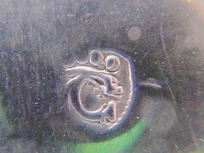 Silver salt spoon with pseudo-hallmark