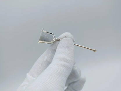 Silver salt spoon with pseudo-hallmark
