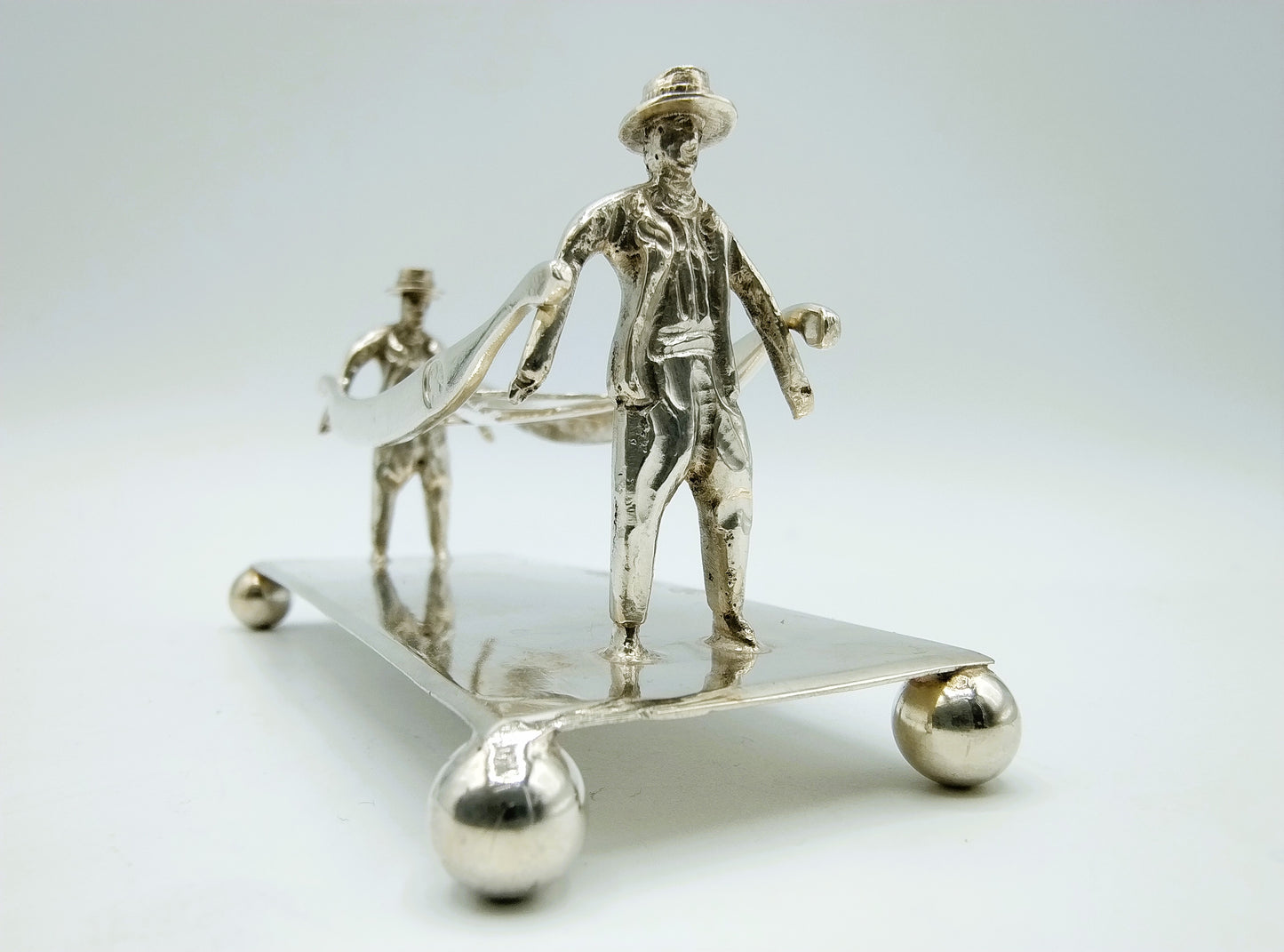 Zilveren miniatuur kaasdragers, D.J. Levert, Alkmaar, 1909