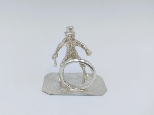 Silver miniature child with hoop, 17th century
