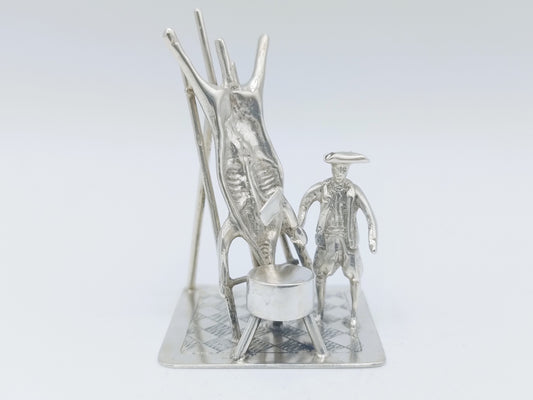 Silver miniature, butcher with pig on ladder, 18th century