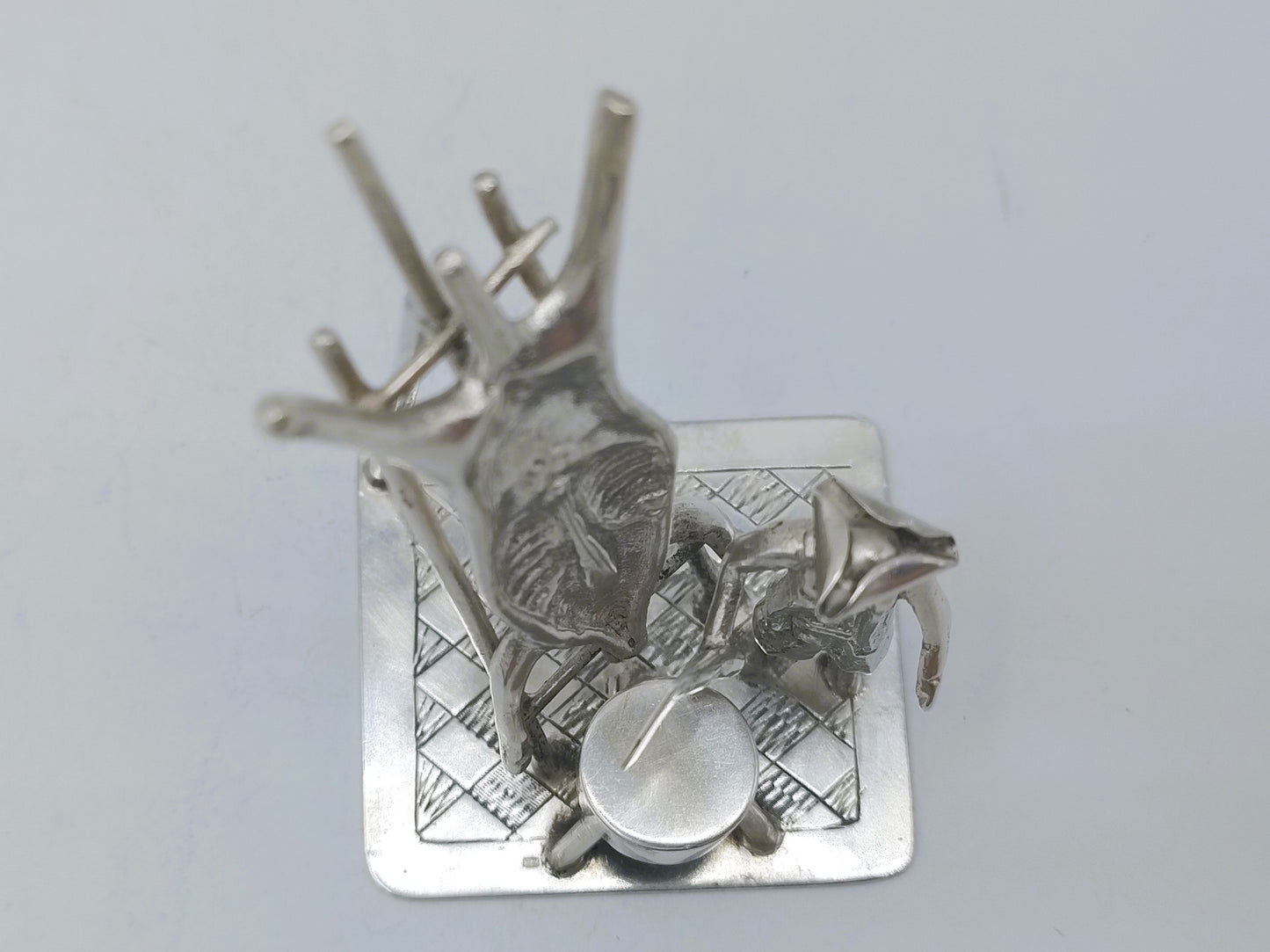 Silver miniature, butcher with pig on ladder, 18th century