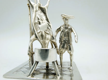 Silver miniature, butcher with pig on ladder, 18th century