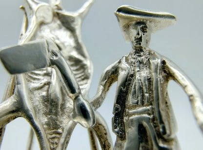Silver miniature, butcher with pig on ladder, 18th century