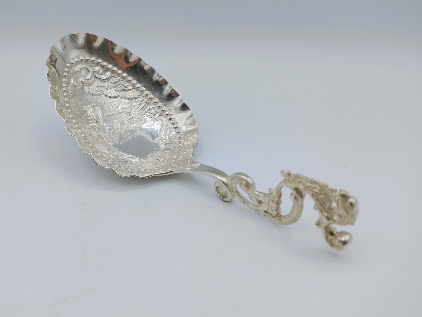 Silver cream spoon, makers' mark S. and H. Reitsma, Sneek, 1905