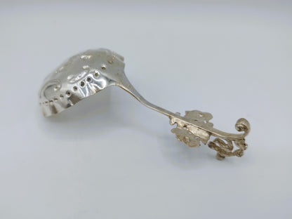 Silver cream spoon, 19th century