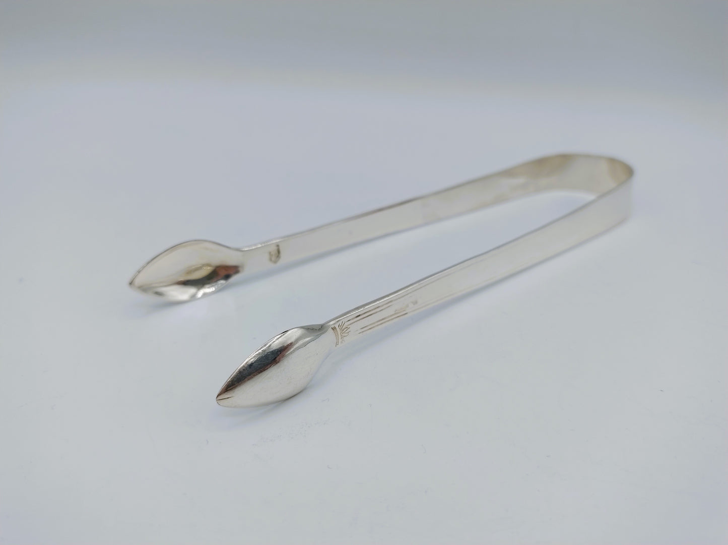 Silver sugar cube tongs, 19th century