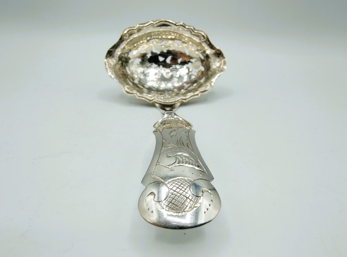 Silver caster spoon, L. van Manen, Sneek, 1853